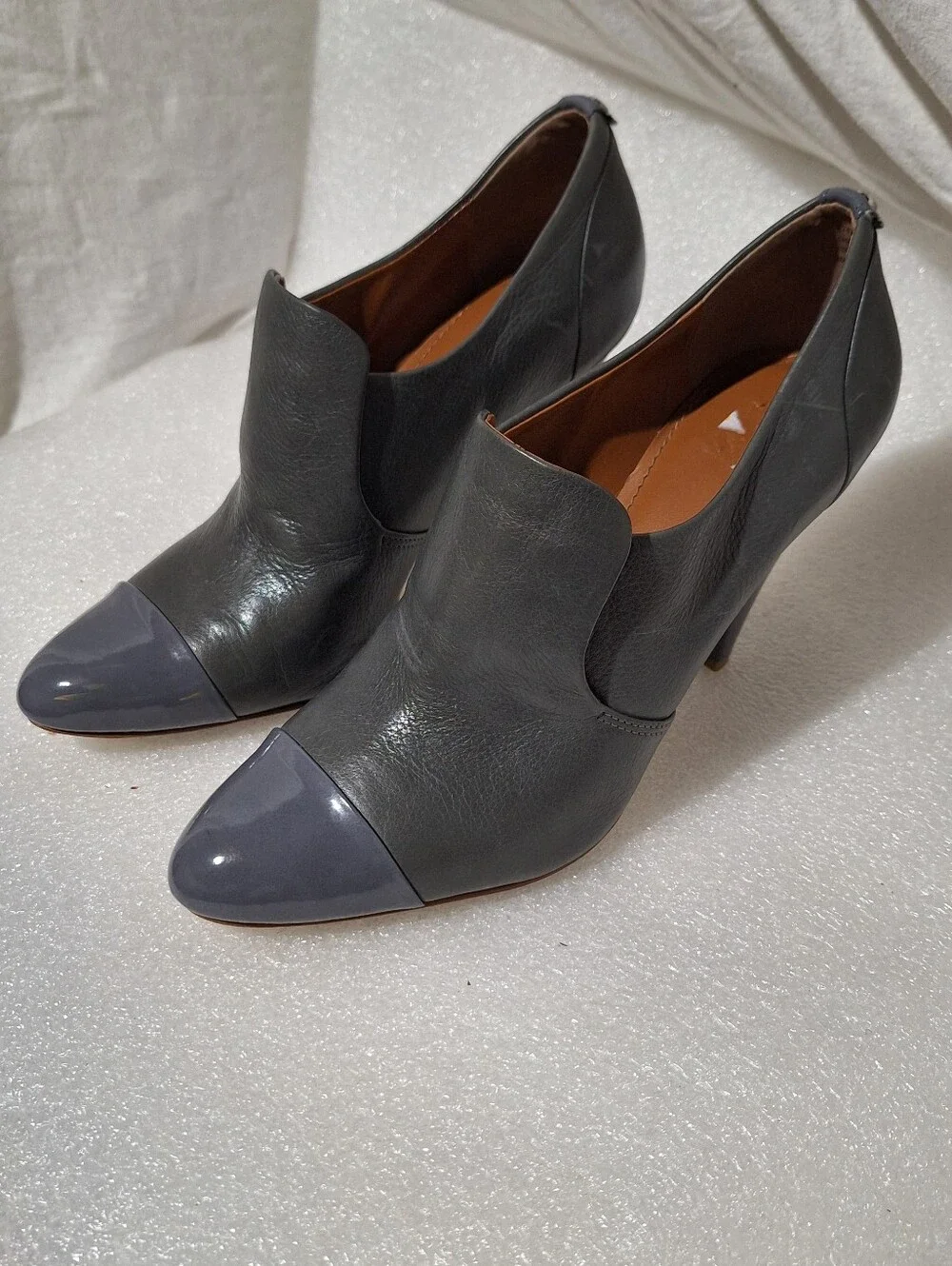 Calvin Klein Two-Tone Gray Pointed Toe High Heel Booties